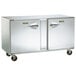 A Traulsen stainless steel undercounter freezer with left and right hinged doors.