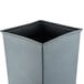 A gray square Rubbermaid rigid plastic liner.