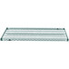 A close-up of a Metro Super Erecta Metroseal 3 green wire shelf.