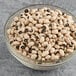 A bowl of dried black eye peas.