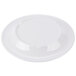 A Kanello white melamine plate with a wide rim and a green circle on the edge.