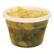 A translucent Pactiv deli container filled with food.