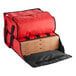 A red CaterGator Dash insulated pizza delivery bag with pizza boxes inside.