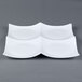 A white CAC porcelain divided tasting plate with three sections.