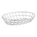 A silver stainless steel Clipper Mill oval grid basket with a wire handle.