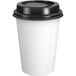 A white Choice paper hot cup with a black lid.