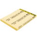 A stack of yellow Rubbermaid absorbent pads with black text on them.