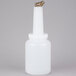 A white plastic Carlisle Store 'N Pour bottle with a brown spout and cap.