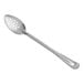 A close-up of a Vollrath stainless steel basting spoon with holes on it.