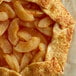 Pear halves in light syrup in a #10 can with a white label.