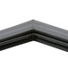 A close up of a black True equivalent magnetic drawer gasket corner.