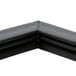 A close up of a black magnetic door gasket corner.