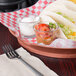 A table with tacos and salsa served in a HS Inc. paprika deli server.