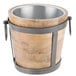 A Telluride natural wood wine and ice bucket with metal handles.