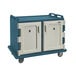 A granite green Cambro meal delivery cart with two doors.