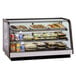 A Federal Industries CRR3628 countertop display case full of food.
