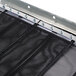 A close-up of a black mesh panel.