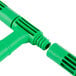 An Unger ThePad StripWasher with Plastic T-Bar, a green plastic pipe with a couple of holes.