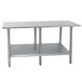 An Advance Tabco stainless steel work table with a galvanized undershelf.