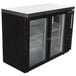 A black Beverage-Air back bar refrigerator with glass doors.