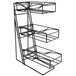 A black metal wire shelf with three baskets on it.