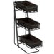A black metal Cal-Mil flatware display with three bamboo bins on each shelf.
