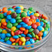 A bowl of colorful M&M's.