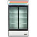 A white True refrigerated glass door merchandiser with LED lighting and three shelves.