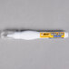 A Bic Wite-Out Shake 'n Squeeze pen with a yellow label and tip.