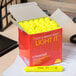 A box of Universal fluorescent yellow desk style highlighters.