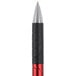 A red and black Universal One Advanced Ink ballpoint pen with a silver tip.