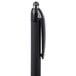 A close up of a black Universal One Comfort Grip retractable ballpoint pen with a silver tip.