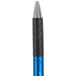 A Universal One blue ballpoint pen with a silver tip on a table.