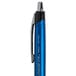 A Universal One blue retractable ballpoint pen with black and silver accents.