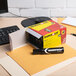 A box of Avery Marks-A-Lot Jumbo Black Chisel Tip Permanent Markers on a desk.