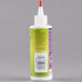 A white Creativity Street bottle of liquid glue with a red cap.