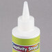 A white bottle of Creativity Street Liquid Kraft Tacky Glue with a white cap and a green label.