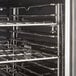 A stainless steel Cooking Performance Group convection oven rack.