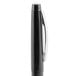 A close-up of a black Universal One rollerball pen with a silver tip.