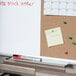 A Universal two panel board with a white dry erase board and a cork board with a calendar and a note.