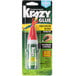 A hand holding a green Krazy Glue container with a red label.