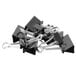 A pile of black Universal small and medium binder clips on a white background.