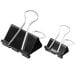 Two black Universal black binder clips.