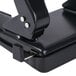 A Universal black countertop power assist hole punch on a table.