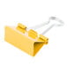 A yellow Universal medium binder clip with silver metal handles.