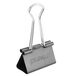 A close-up of a Universal medium black binder clip.