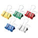 A box of Universal small binder clips in assorted colors, including blue, green, red, and yellow.