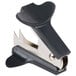 A Universal black jaw style staple remover with a metal clip.