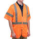 A man wearing a Cordova orange safety vest with reflective stripes.