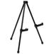 A black steel portable tabletop easel with two legs on it.